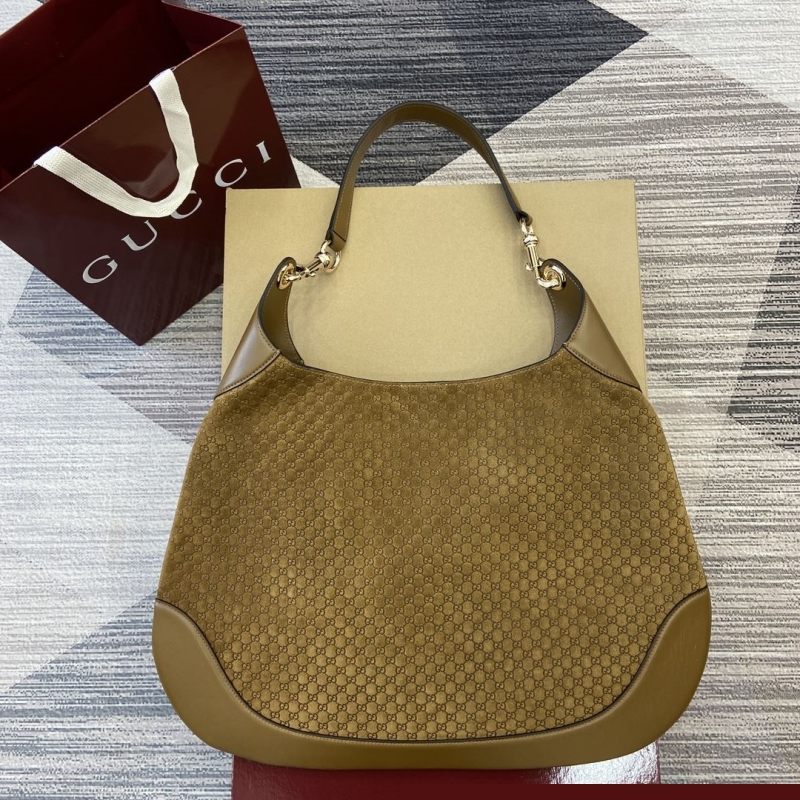 G*u*i top handle bags